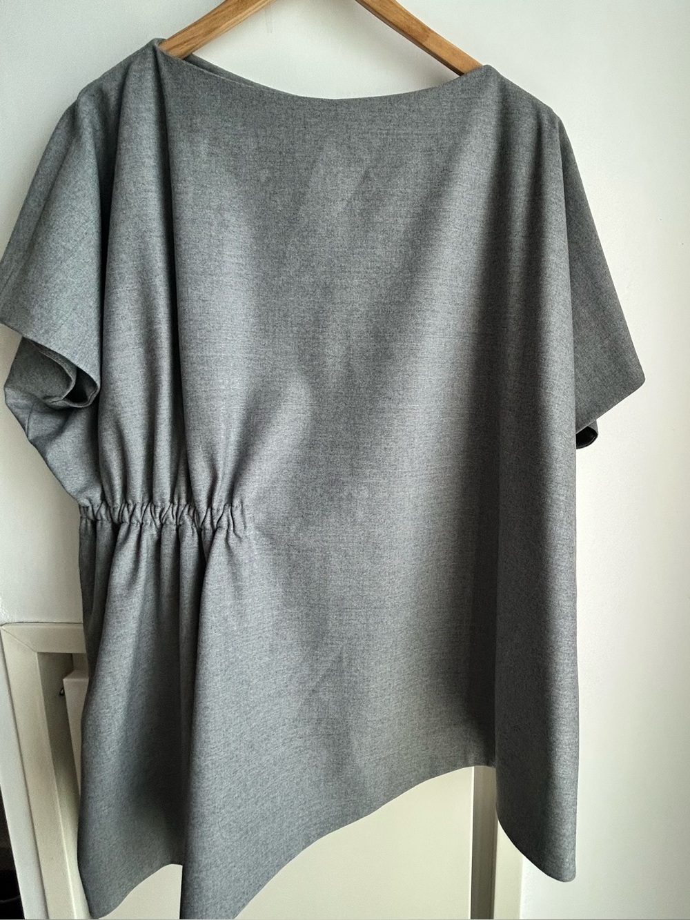 COS Women’s Short-Sleeve, Danish-inspired Asymmetrical Top with Pinched Waist.